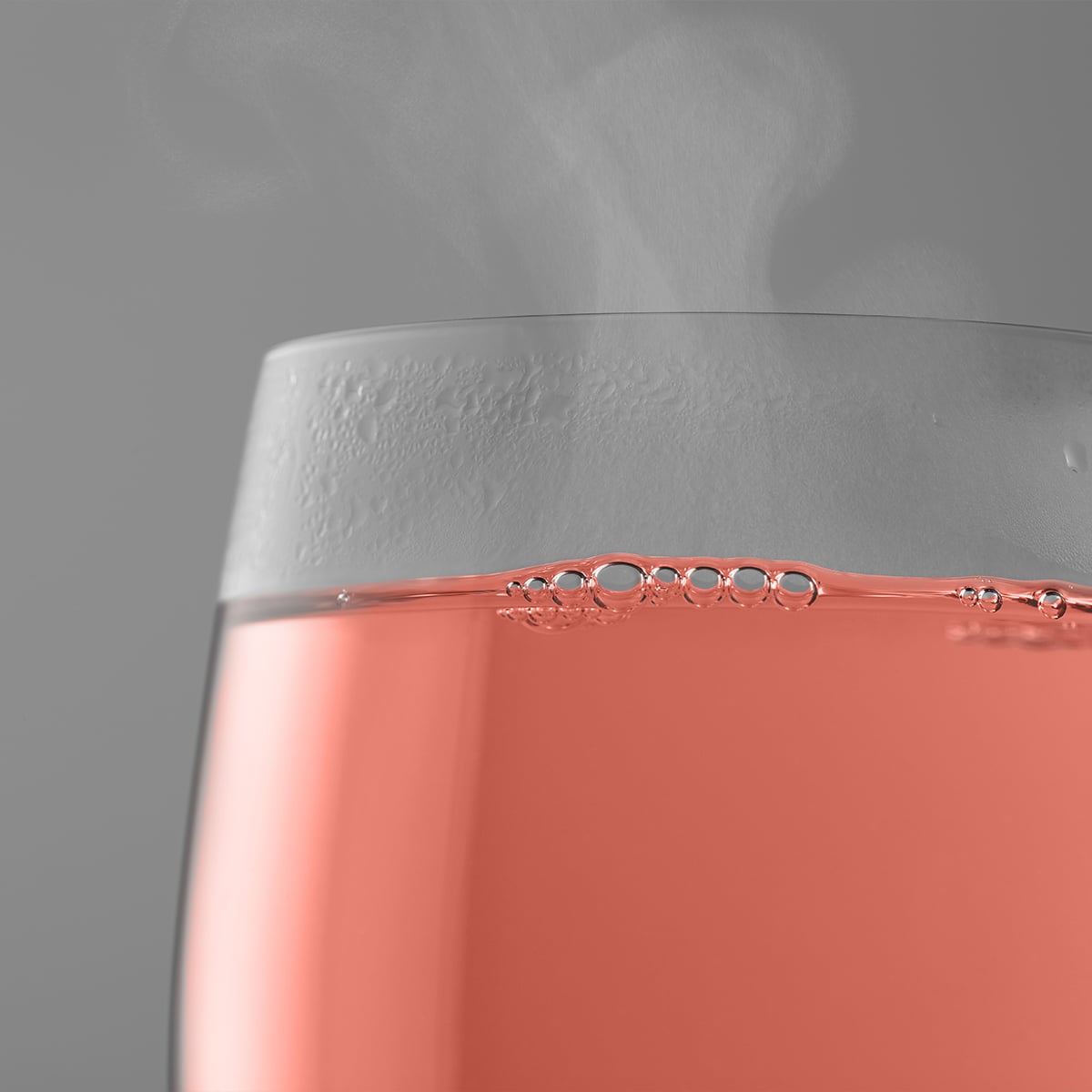 Glas mit aufgebr&uuml;hter Avoury Funky Melon Fr&uuml;chtetee-Infusion
